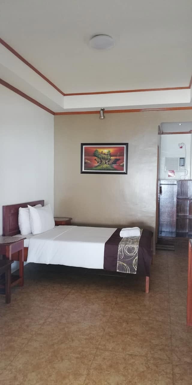 Single-bed guest room at JD Beach Front Hotel