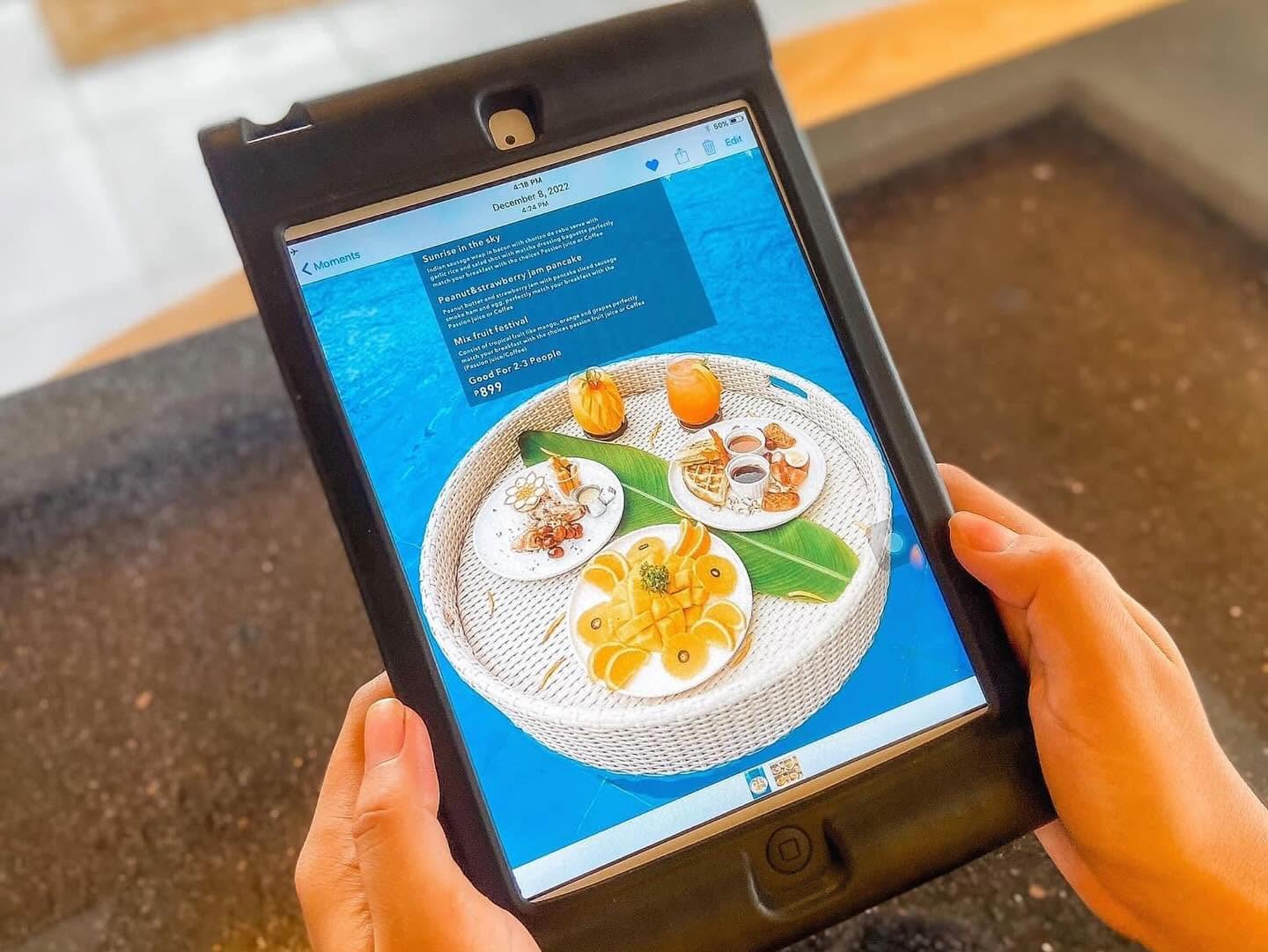 MIST floating breakfast menu on a tablet